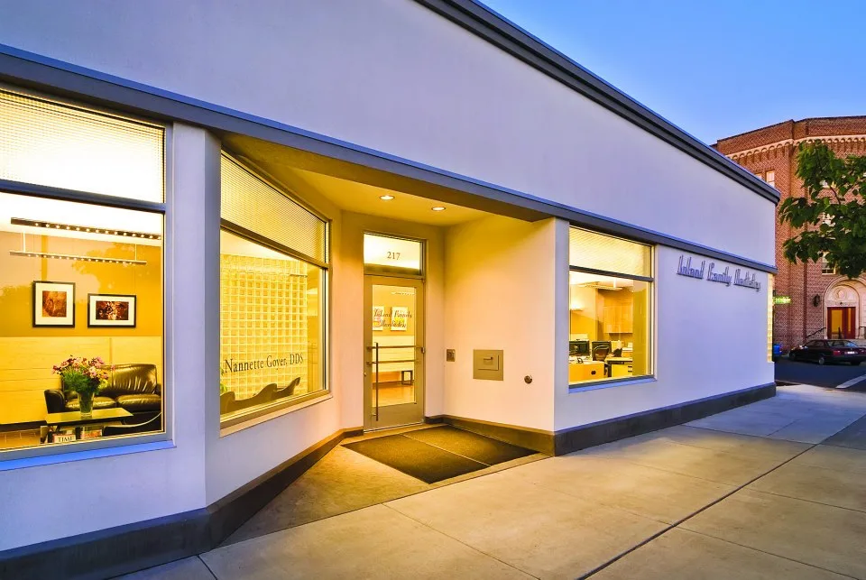 Inland Family Dentistry Art Moderne storefront at dusk