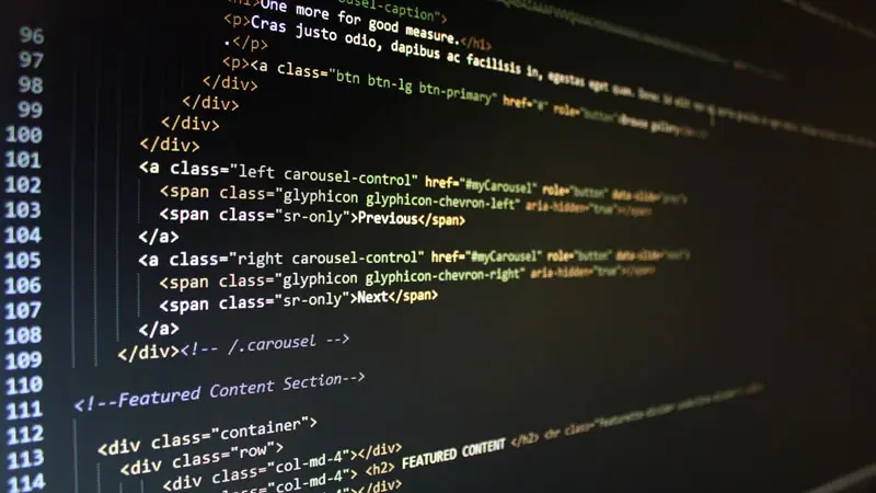 A screen of HTML markup showing a page section with class names and a featured content comment